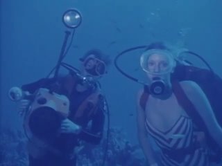 scuba diver woman and moray eel 1995